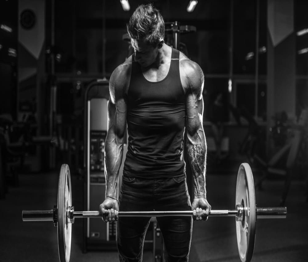 Discover the benefits of barbell raises and take your fitness to the next level with us